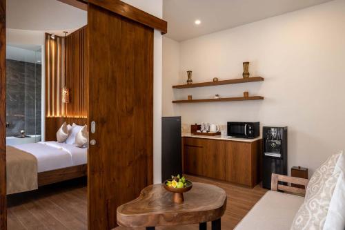 Imagen de la habitación del Hotel The Prime Canggu Bali. Foto 20