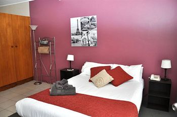 Imagen de la habitación del Hotel The Prince Mark Motor Inn. Foto 11