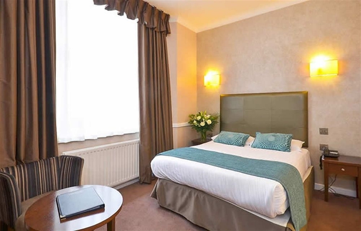 Imagen de la habitación del Hotel The Princes Square. Foto 8