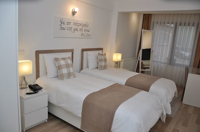 Imagen de la habitación del Hotel The Print House. Foto 10