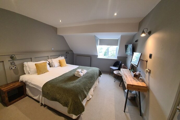 Imagen de la habitación del Hotel The Priory Inn. Foto 14