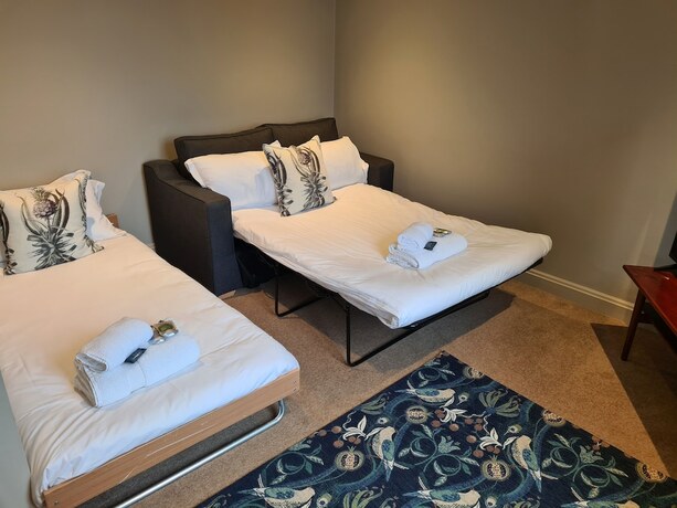 Imagen de la habitación del Hotel The Priory Inn. Foto 16