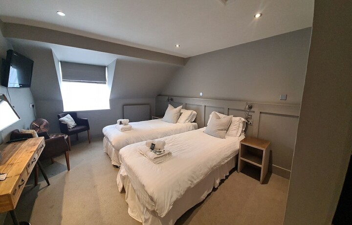 Imagen de la habitación del Hotel The Priory Inn. Foto 17