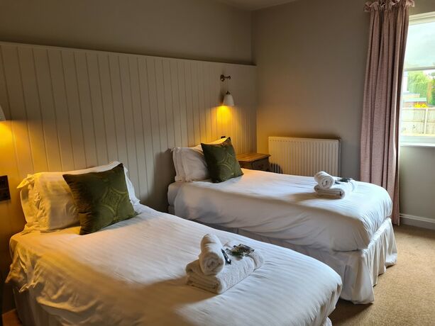 Imagen de la habitación del Hotel The Priory Inn. Foto 19