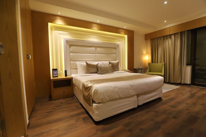 Imagen de la habitación del Hotel The Pristine Kanpur. Foto 9