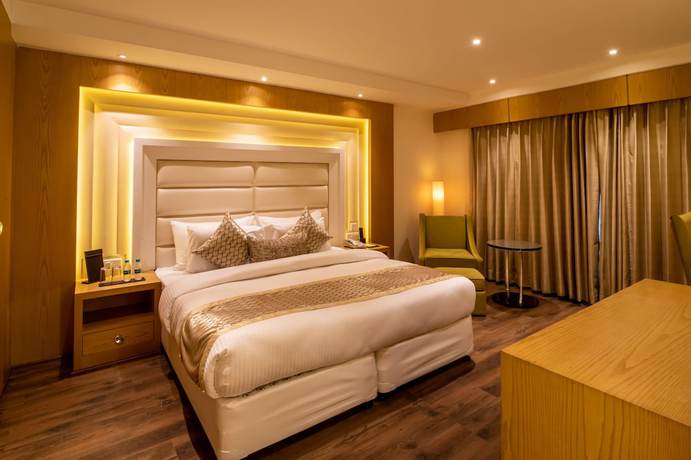 Imagen de la habitación del Hotel The Pristine Kanpur. Foto 10