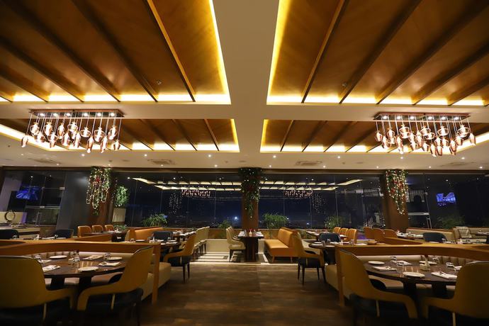 Imagen del bar/restaurante del Hotel The Pristine Kanpur. Foto 3