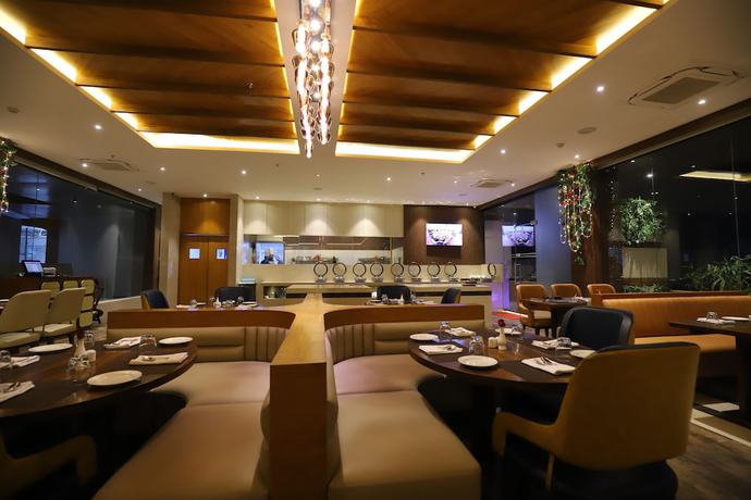 Imagen del bar/restaurante del Hotel The Pristine Kanpur. Foto 5