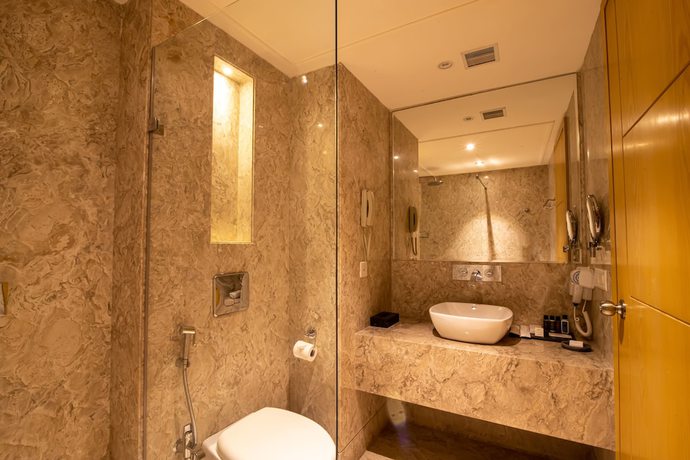 Imagen de la habitación del Hotel The Pristine Kanpur. Foto 11