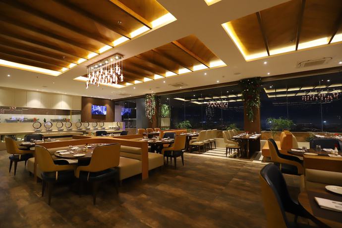Imagen del bar/restaurante del Hotel The Pristine Kanpur. Foto 6