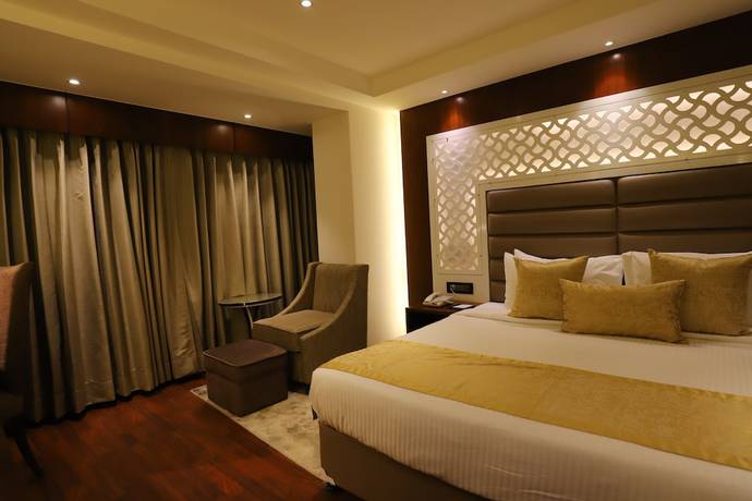 Imagen de la habitación del Hotel The Pristine Kanpur. Foto 16