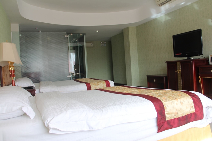 Imagen de la habitación del Hotel The Privi Suites. Foto 5