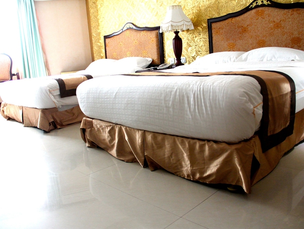 Imagen de la habitación del Hotel The Privi Suites. Foto 7