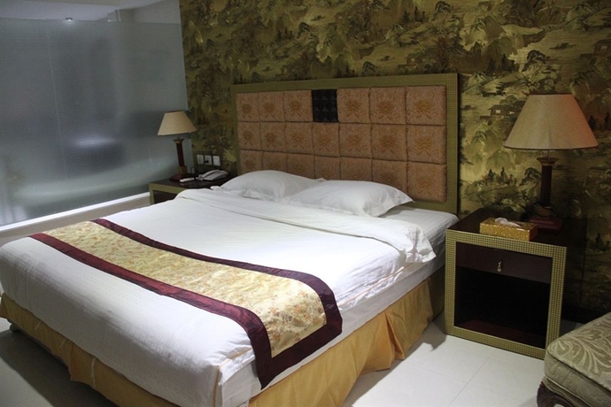 Imagen de la habitación del Hotel The Privi Suites. Foto 9