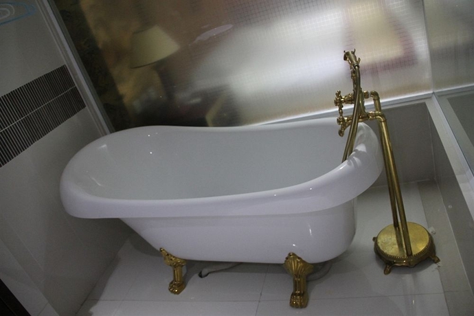 Imagen de la habitación del Hotel The Privi Suites. Foto 11