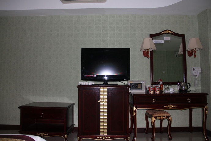 Imagen de la habitación del Hotel The Privi Suites. Foto 12