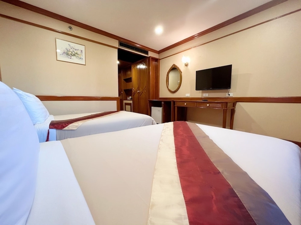 Imagen de la habitación del Hotel The Promenade. Foto 10