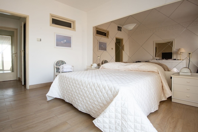 Imagen de la habitación del Hotel The Promenade Luxury Wellness. Foto 5