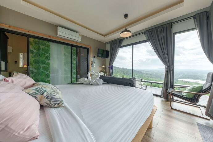 Imagen de la habitación del Hotel The Proud Green Garden Hill Resort. Foto 22