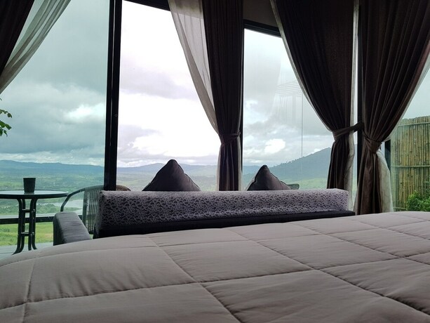 Imagen de la habitación del Hotel The Proud Green Garden Hill Resort. Foto 24
