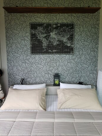 Imagen de la habitación del Hotel The Proud Green Garden Hill Resort. Foto 27