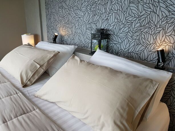 Imagen de la habitación del Hotel The Proud Green Garden Hill Resort. Foto 31