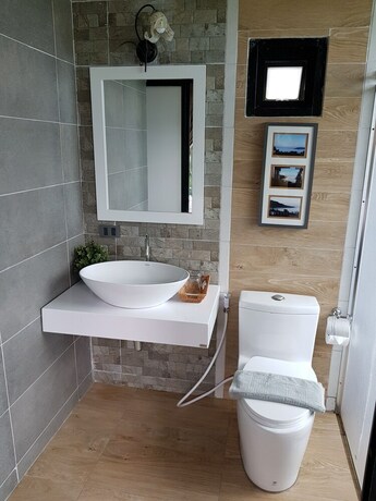 Imagen de la habitación del Hotel The Proud Green Garden Hill Resort. Foto 36
