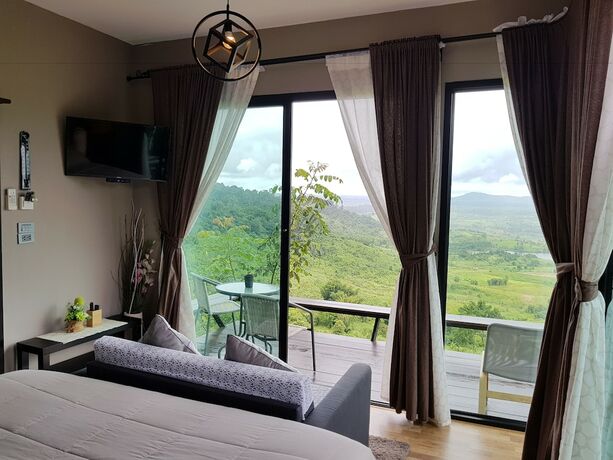 Imagen de la habitación del Hotel The Proud Green Garden Hill Resort. Foto 38
