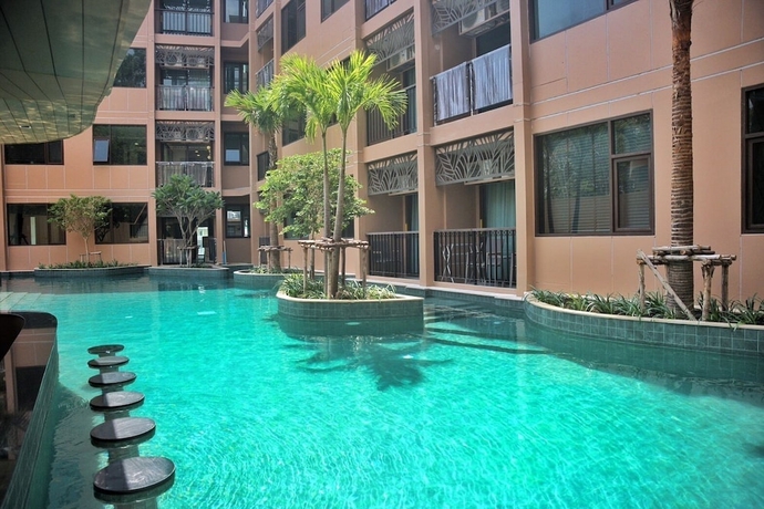 Imagen de la piscina del Hotel The Proud Karon Beach Phuket Trademark Collection By Wyndham. Foto 19