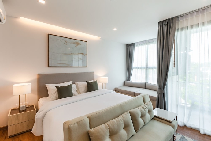 Imagen de la habitación del Hotel The Proud Rawai. Foto 2