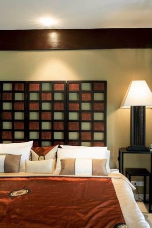 Imagen de la habitación del Hotel The Puka Boutique Resort. Foto 8