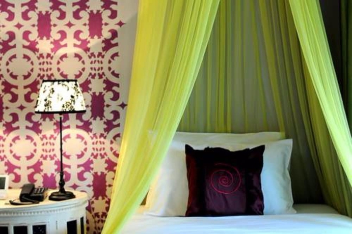 Imagen de la habitación del Hotel The Puka Boutique Resort. Foto 9