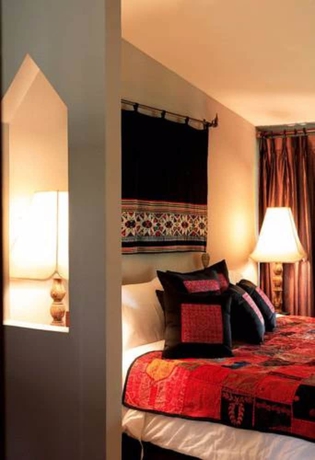 Imagen de la habitación del Hotel The Puka Boutique Resort. Foto 11