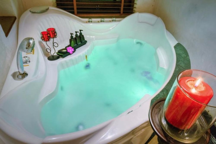 Imagen de la habitación del Hotel The Puka Boutique Resort. Foto 19