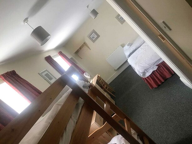 Imagen de la habitación del Hotel The Punchbowl Inn. Foto 20