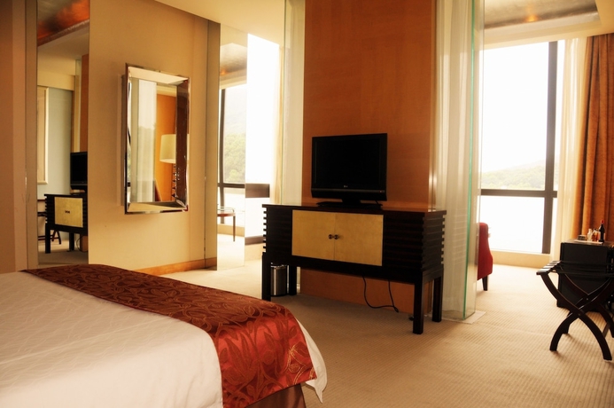 Imagen de la habitación del Hotel The Purple Palace Nanjing. Foto 4