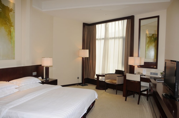 Imagen de la habitación del Hotel The Purple Palace Nanjing. Foto 10