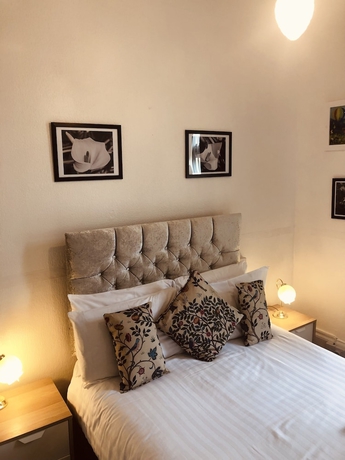 Imagen de la habitación del Hotel The Purple Tree Guest House. Foto 3