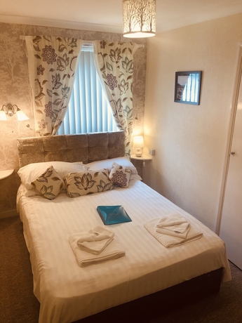 Imagen de la habitación del Hotel The Purple Tree Guest House. Foto 10