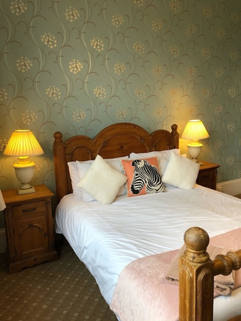 Imagen de la habitación del Hotel The Purple Tree Guest House. Foto 12