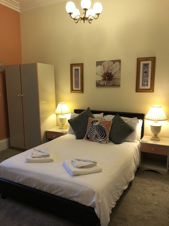 Imagen de la habitación del Hotel The Purple Tree Guest House. Foto 18