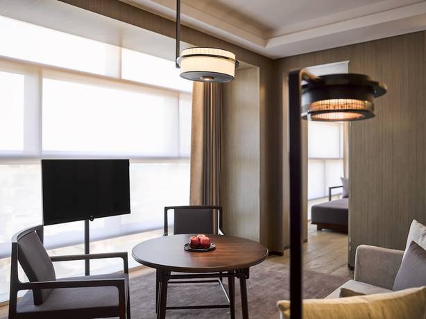 Imagen de la habitación del Hotel The Puxuan and Spa. Foto 2