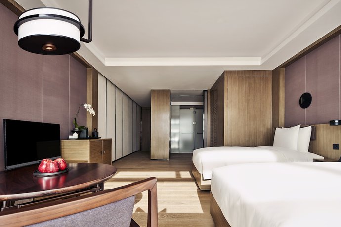 Imagen de la habitación del Hotel The Puxuan and Spa. Foto 15