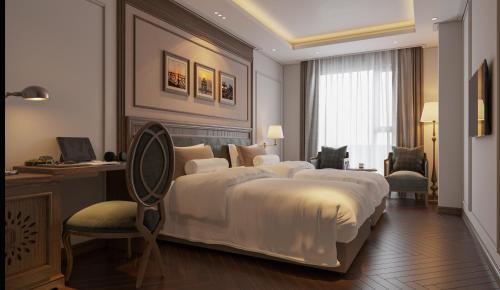 Imagen de la habitación del Hotel The Q Boutique. Foto 16