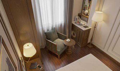 Imagen de la habitación del Hotel The Q Boutique. Foto 17