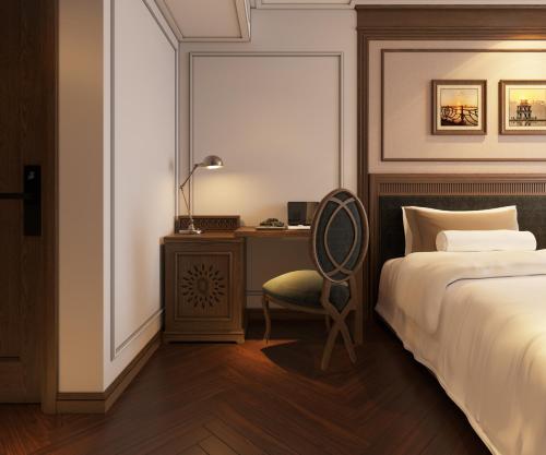 Imagen de la habitación del Hotel The Q Boutique. Foto 19