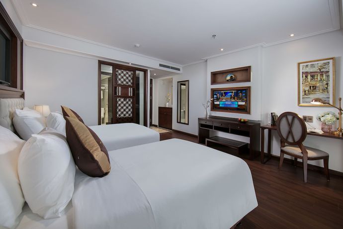 Imagen de la habitación del Hotel The Q Hanoi. Foto 10