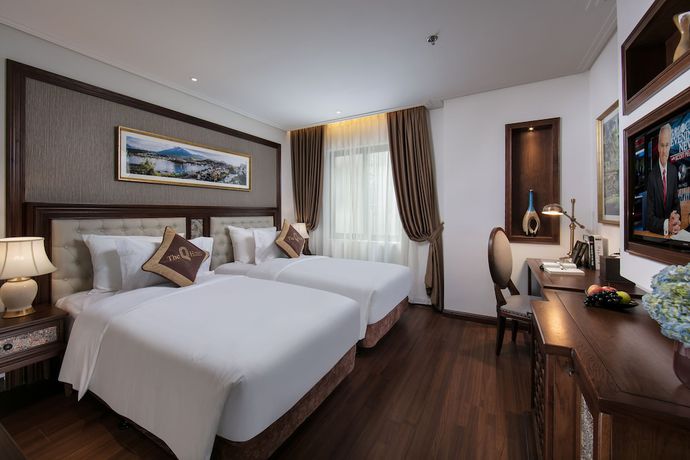 Imagen de la habitación del Hotel The Q Hanoi. Foto 12