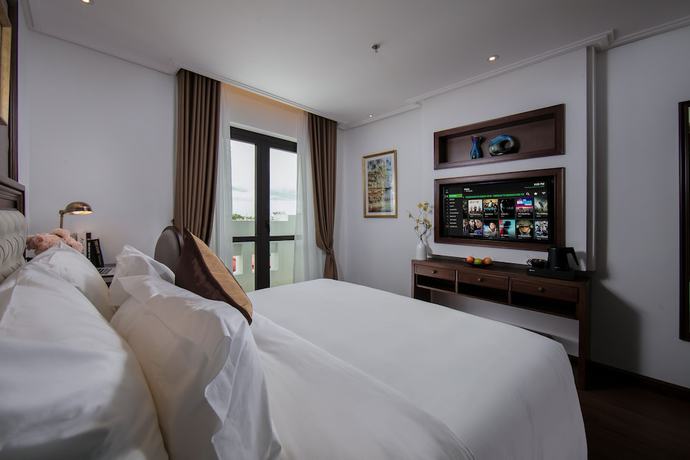 Imagen de la habitación del Hotel The Q Hanoi. Foto 16