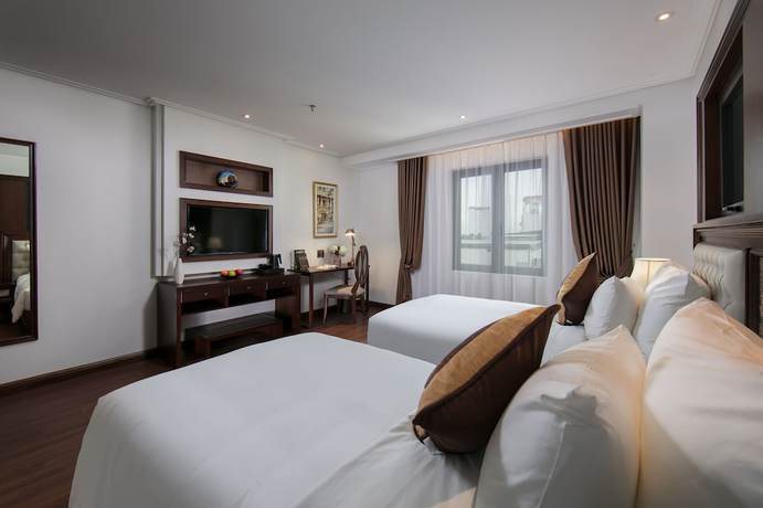 Imagen de la habitación del Hotel The Q Hanoi. Foto 17